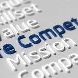 Hervorgehobene Begriffe wie Core Competence, Mission, Value und Skillset auf grauem Hintergrund – symbolisiert strategische Kompetenzmodelle und unternehmerische Kernfähigkeiten